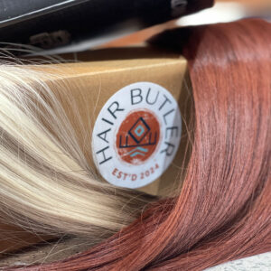 Hair Butler™ hair extension workstation tool box and blonde and red hair extensions