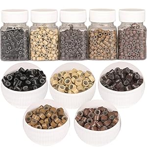 Hair Extension Micro Rings separated into several colors in jars and bowls Hair Butler™ hair extension workstation tool