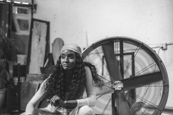 Fan blowing in a salon, representing hot summer service days and the need for cleaner workflow behind the chair.