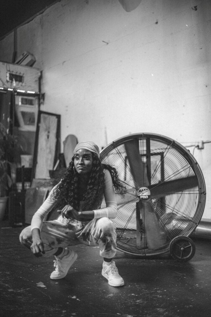 Fan blowing in a salon, representing hot summer service days and the need for cleaner workflow behind the chair.