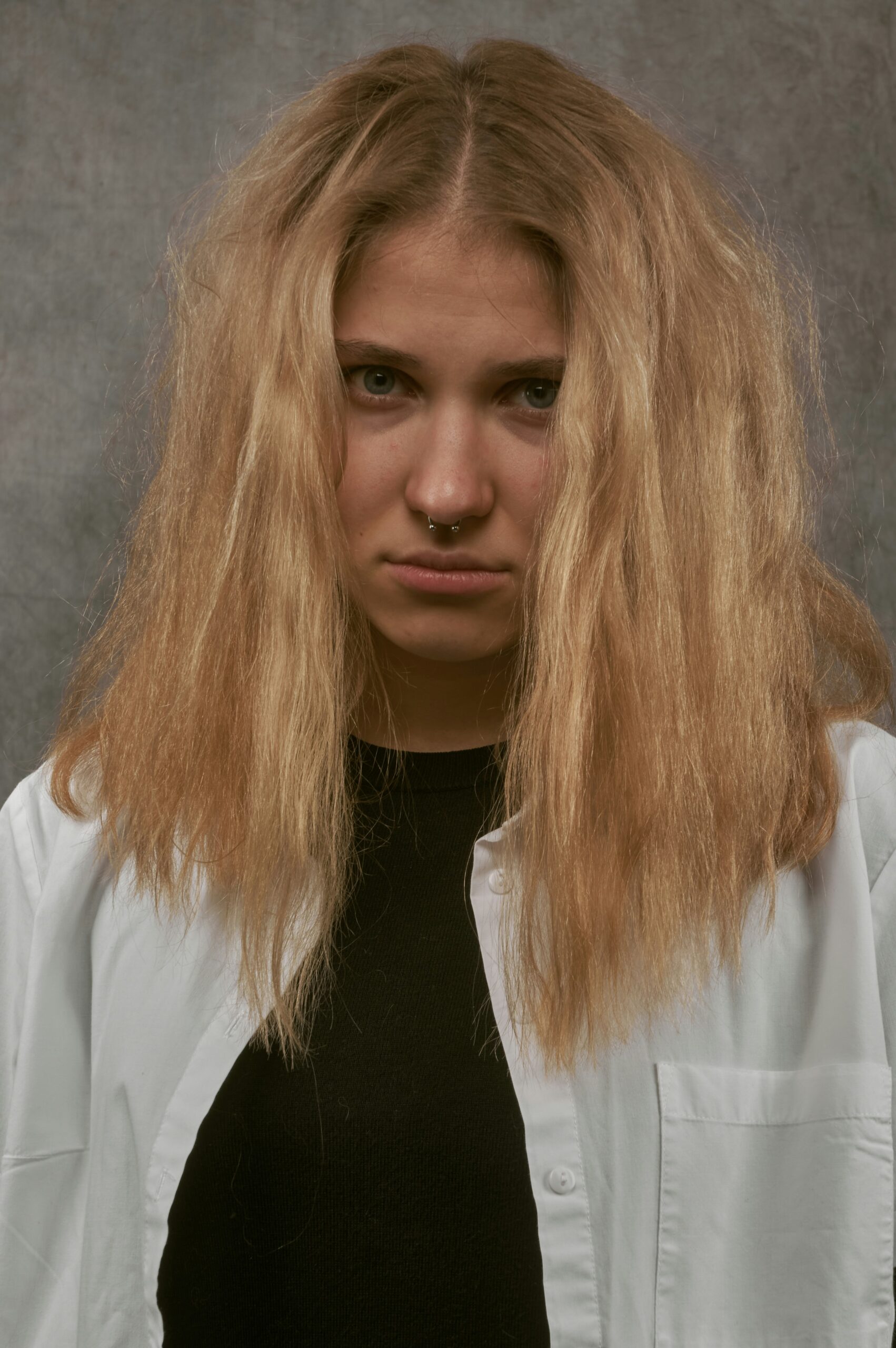 Professional extension stylist workflow during hair install