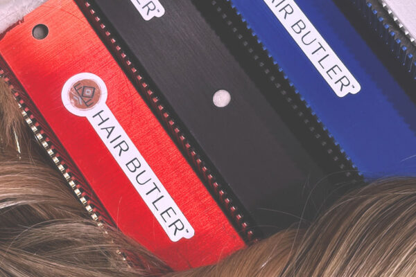 close up of five color choices of Hair Butler™ hair extension workstation tool