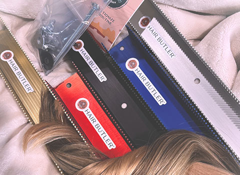 close up of five color choices of Hair Butler™ hair extension workstation tool